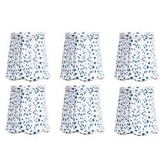 six white and blue polka dot lampshades