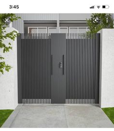 an image of a modern gated entrance to a house