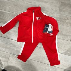 Brand New With Tags. Red Tracksuit For Toddler 2t. Red Long Sleeve Sports Sets, Sporty Red Long Sleeve Set, Red Sports Sets For Winter, Red Sportswear Sets For Sports, Red Winter Sports Sets, Red Sports Sets For Spring, Sporty Red Sets For Spring, Sporty Red Playwear Set, Red Sporty Playwear Sets