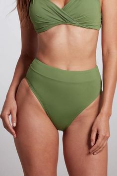 Green high waisted, high leg cut bikini bottom. High Waist Green Bottoms, High Waist Green Bottoms For Poolside, High Waist Olive Bottoms For Summer, Olive High Waist Bottoms For Summer, Green High Waist Swimwear For Poolside, Green Brief Swimwear For Pool, High Waist Green Bottoms For Beach, Green Solid Color Swimwear For Summer, High Waist Green Swimwear For Pool