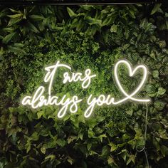 there is a neon sign that says it's always you