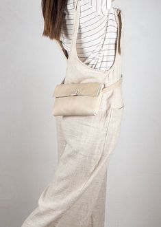 HANDCRAFT BEIGE LIGHT BROWN BELT BAG. Small Fanny Pack - Waist bag versatile manufactured 100% with high quality leather. Our design its original minimalist waist bag, ergonomic. Ideal for everyday, comfortable and convenient to carry than necessary. Totally made for Nubuckcuir with handmade process, ensuring always the maximum quality. Brown Soft Leather Belt Bag, Beige Leather Pouch Belt Bag, Trendy Soft Leather Belt Bag For On-the-go, Soft Leather Belt Bag For On-the-go, Leather Belt Bag With Anti-theft Pocket, Leather Laptop Backpack, Small Leather Bag, Women Leather Backpack