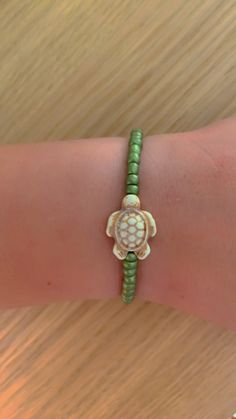 This bracelet comes in 2 different sizes if you need a size please leave a note on your order. Adjustable Turtle Bracelet For Beach, Handmade Adjustable Turtle Bracelet, Turtle Bracelet, Green Turtle, Green Glass, Glass Beads, Jewelry Bracelets, Bracelet, Handmade Items