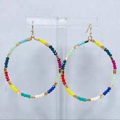 Add A Swingy Addition To Your Look.Small Colorful Seed Beads On This Dainty Front Facing Hoop Adds A Sense Of Your Carefree Whimsy & Fun Spirit With Every Turn Of Your Head. 2 1/2” Length Approximate Size Hand Beaded/Wire Threaded Multi-Colored Glass Beads Summer Faceted Beads Earrings, Everyday Colorful Beaded Hoop Earrings, Multicolor Beaded Small Hoop Jewelry, Cheap Multicolor Beaded Hoop Earrings, Summer Rainbow Beaded Earrings, Multicolor Hypoallergenic Hoop Beaded Earrings, Adjustable Colorful Beaded Circle Hoop Earrings, Blue Drop Earrings, Starfish Earrings