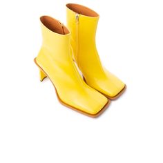 Detail(s):  Square Toe 3'' Heel Medial Side Zip Closure Material(s):  Leather Upper  Leather Insole & Lining Made in Spain Color(s):  Yellow Shoes Yellow, Colour Wheel, Yellow Boots, Platform Flats, Mid Boots, Daisy Duck, How To Stretch Boots, Casual Heels, Boot Pumps