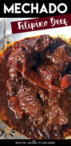 a close up of a plate of food with meat and vegetables in sauce on it