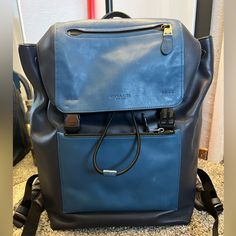 Coach Backpack. Navy Blue Color, Slight Scuffs From Regular Use But Still In Really Great Condition. Modern Blue Leather Backpack For Travel, Coach Rectangular Everyday Backpack, Coach Rectangular Leather Backpack For Travel, Coach Travel Backpack With Dust Bag, Blue Leather Backpack For Travel, Coach Backpack With Removable Pouch For School, Rectangular Coach Backpack For Daily Use, Coach Rectangular Backpack For Daily Use, Blue Leather Backpack For School