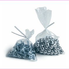 two bags filled with metal balls and screws