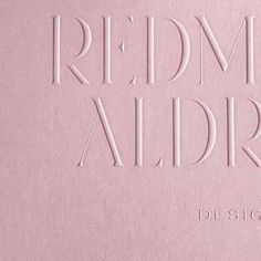 a pink book with the words redmond aldre written in white on it's cover