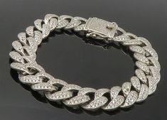 "925 Sterling Silver - Vintage Cubic Zirconia Curb Link Chain Bracelet - BT5605  925 Sterling Silver - Vintage Cubic Zirconia Curb Link Chain Bracelet - BT5605  Jewelry Type:         Bracelet   Metal Type:            925 Silver  Metal Size:             8.5\" Length  .50\" Height   Stone Type:            Cubic Zirconia   Condition:              N/A  Jewelry Weight:     58.2 Grams  PLEASE NOTE: THIS ITEM IS PRE-OWNED. ALTHOUGH MOST ITEMS ARE IN VERY GOOD CONDITION, SOME MAY NEED CLEANING AND/OR MINOR REPAIRS. WE MAKE A VERY STRONG EFFORT TO UPLOAD CLEAR PICTURES. PLEASE INSPECT ALL PICTURES AND ASK ALL QUESTIONS YOU MAY HAVE PRIOR TO MAKING A PURCHASE. NOT ALL STONES ARE GENUINE, SOME ARE ENHANCED OR CREATED." Bracelet Metal, Link Chain Bracelet, Metal Bracelets, Link Chain, Arm Band, Chain Bracelet, Types Of Metal, Metallic Silver, 925 Silver