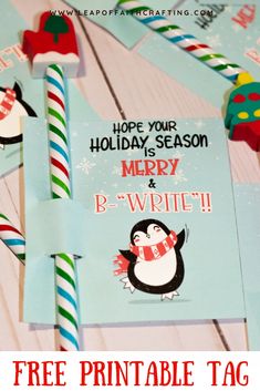 a penguin christmas card with candy canes on it