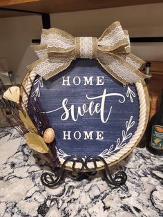 a wooden sign that says home sweet home