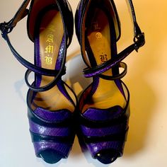 Size 9. Worn Maybe A Handful Of Times. Look Brand New. Originally $495. Luxury Purple Heels With 4-inch Heel, Chic Purple Leather Heels, Purple Heels With Leather Sole For Formal Occasions, Purple Heels With Leather Sole For Formal Events, Designer Purple Leather Heels, Formal Purple Heels With Leather Sole, Purple High Heel Shoes With Leather Sole, Purple Leather Heels With 4-inch Heel, Purple High Heels With Leather Sole