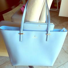 Authentic Kate Spade Shoulder Tote With Wallet, They Are In Excellent Condition, Almost Like New. Leather Materials On The Exterior. The Purse And The Wallet Never Sat On The Floor, No Pens Ever Kept Inside, Very Clean. Elegant Light Blue Shoulder Bag For Travel, Elegant Light Blue Travel Bag, Elegant Light Blue Office Bag, Luxury Kate Spade Light Blue Bag, Luxury Light Blue Kate Spade Bag, Elegant Light Blue Shoulder Bag For Shopping, Elegant Light Blue Shopping Bag, Formal Light Blue Kate Spade Bag, Kate Spade Light Blue Bag For Shopping