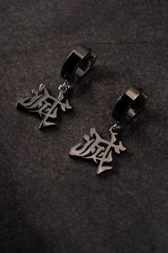 滅 The Demon Slayer Corps. An organization that has dedicated its existence to protecting humanity from demons, easily recognizable by the Destroy Kanji on their backs, symbolizing death to demons and hope to everyone else. Materials: Stainless Steel. Clip-ons available on request. Earring dimensions: Approx. 1.25" by .5" (including earring hoop) Destroy Kanji, Male Earrings, Best Earrings For Men, Demon Slayer Corps, Emo Jewelry, The Demon Slayer, Minimalist Fashion Men, Earring Hoop, Free Earrings