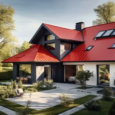 a red metal roof on a house in the middle of some grass and trees with chairs around it