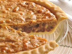 a pie sitting on top of a glass plate