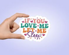 someone is holding up a sticker that says if you love me let me sleep