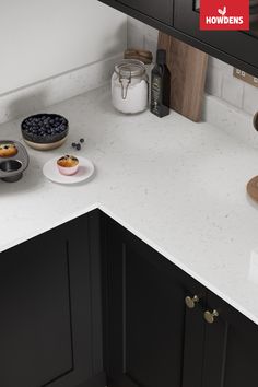 the kitchen counter is clean and ready to be used for breakfast or desserts,