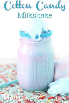 a mason jar filled with cotton candy milkshake