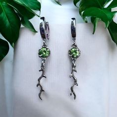 peridot fairy earrings, kawaii earrings , olive earrings, earrings dangle flower , peridot aesthetic earrings This earrings is made of molten sterling silver with high quality natural green peridot , made as a shape of olive leaf , perfect as a gift for a loved one or friend, for a statement piece, as an anniversary gift or for your mom Each earrings is handmade and therefore completely unique. it takes 5 to 16 working days to create and ship. Materials: -925 sterling silver -Natural stone of yo Dainty Green Flower Earrings, Nature-inspired Green Dangle Flower Earrings, Dainty Green Drop Flower Earrings, Dainty Green Flower Earrings With Ear Wire, Green Dainty Drop Flower Earrings, Green Dainty Flower Drop Earrings, Green Hypoallergenic Dangle Flower Earrings, Hypoallergenic Green Dangle Flower Earrings, Green Sterling Silver Flower Drop Earrings