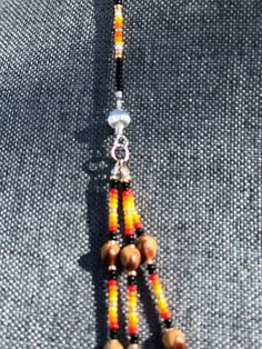 Bohemian Double Strand Jewelry With Tiny Beads, Brown Heishi Beads Jewelry With Tiny Beads, Southwestern Necklaces With Dangling Beads And Adjustable Fit, Adjustable Southwestern Jewelry With Silver Beads, Southwestern Necklaces With Dangling Beads, Southwestern Necklace With Dangling Beads And Adjustable Fit, Adjustable Southwestern Silver Beaded Jewelry, Multicolor Southwestern Beaded Necklace With Dangling Beads, Bohemian Lariat Jewelry With Tiny Beads