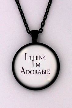 a necklace that says i think i'm adorabie on the inside of it