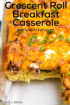 a casserole dish with cheese and meat in it