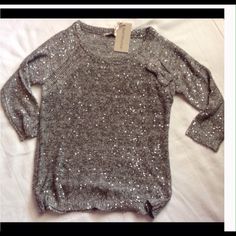 Silver Sequined Sweater With Bow Accent. New With Tags. Long Sleeves. Polyester/Cotton. Has A Couple Of Snags (Pictured) Which Are Normal For This Type Of Sweater. Best Mountain. Has Been Folded-Not Hung On Hanger. Size Medium (8ish) Trendy Silver Tops For Winter, Casual Sequin Party Sweater, Fitted Sequin Sweater For Party, Casual Silver Sequined Tops, Women’s Silver Sweaters, Pink Sequined Crew Neck T-shirt, Sequin Sweater, Colorful Sweaters, Amazing Women