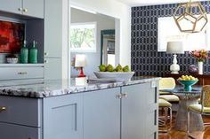 the kitchen is clean and ready to be used as a dining room or living room