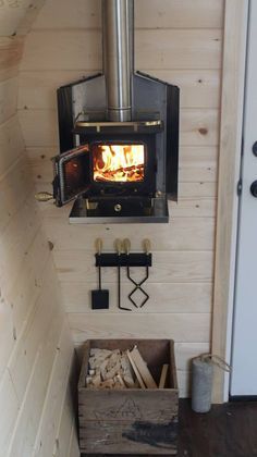 a wood burning stove in the corner of a room