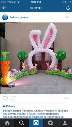 an easter decoration with balloons in the shape of rabbits and carrots is displayed on instagram