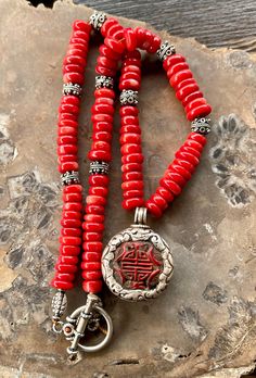 Handmade Red Medallion Necklace, Red Vintage Hand-strung Jewelry, Red Coral Pendant Necklace, Red Coral Spiritual Necklaces, Spiritual Red Coral Necklaces, Spiritual Red Coral Necklace, Red Amulet Pendant Necklace, Traditional Red Medallion Necklace, Red Spiritual Necklace With 108 Beads