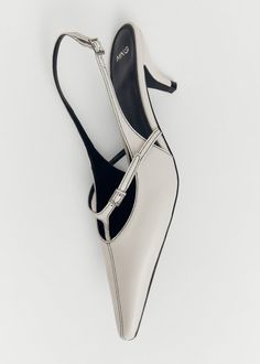 Leather heeled slingback shoes with buckles - Women | Mango USA Luxury Slingback Kitten Heels With Buckle Closure, Classic Heels With Tang Buckle And Open Heel, Formal Slingback Heels With Tang Buckle, Luxury Leather Kitten Heels With Buckle, Luxury Leather Kitten Heels With Buckle Closure, Chic White Slingback Pumps With Buckle Closure, Formal High Heels With Tang Buckle, White High Heel Slingback Pumps With Buckle Closure, Chic Formal Slingback Pumps With Tang Buckle