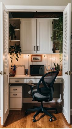 an office chair sitting in front of a computer desk