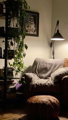 a living room filled with furniture and a lamp