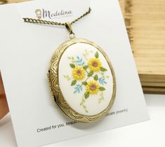 This is a handcrafted personalized locket necklace with 2 photos/messages inside, a detailed design from clay and metal base. Best gift ideas for mother, wife, sister, aunt, daughter, or grandmother for Mother's Day, wedding, her birthday, or other occasions. 🍃HANDCRAFTING AND PROCESSING TIME This jewelry is already made and is ready to be personalized with photos/text for you. I create by hand each piece of jewelry, the design is intricate and delicate. The time to create such jewelry is long, White Engraved Locket Necklace For Wedding, Engraved White Locket Necklace For Wedding, Flower Shaped Locket Jewelry For Wedding, Flower Shaped Locket Necklaces For Weddings, Flower Pendant Locket Jewelry For Wedding, Floral Wedding Locket Jewelry, Flower Shaped Wedding Locket Jewelry, Wedding Jewelry Flower Locket Pendant, Wedding Flower Pendant Locket Jewelry