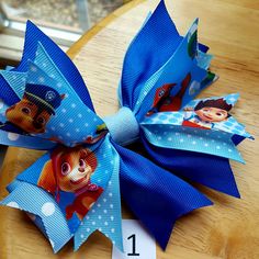 Paw Patrol Theme Pinwheel Hair Bow Hair Clip Made By Norma's Unique Gift Baskets. Paw Patrol Theme, Unique Gift Baskets, Best Hair Straightener, Making Hair, Bow Hair Clip, Hair Straighteners, Head Bands, Making Hair Bows