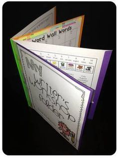 two folders with writing on them and the words word wall words written in it