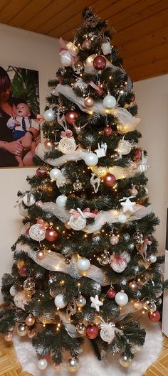 a christmas tree decorated with ornaments and lights