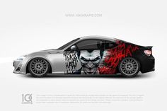 the joker car wrapper is designed to look like it has been painted with graffiti