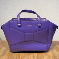 Kate Spade Zip-Top Tote. Condition-Unused. Purple With Gold Trim. Single Exterior Pocket, Multiple Interior Liner Pockets Of Various Size. Kate Spade Tote Bag, Kate Spade Totes, Nylon Tote Bags, Satchel Tote, Blue Tote, Woven Tote Bag, Kate Spade Handbags, Kate Spade Purse, Nylon Tote