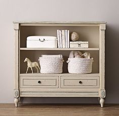 an old bookcase with baskets and toys on the top is shown in this image