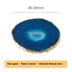 a blue agate stone with gold trimmings on the edges and bottom, in front of a white background