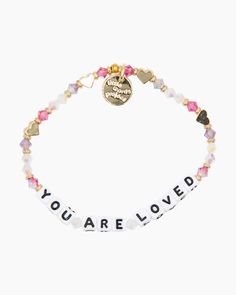 Add a trendy personal touch to your bracelet stack with this bracelet from the Little Words Project! The stunning assortment of beads offers plenty of color and texture, and the letter beads spell out ""YOU ARE LOVED"" - a message that's sure to inspire any day of the year.One size elastic stretch braceletHand-crafted crystal beaded braceletPlated brass hardwareHandle with care - do not wet Meaningful Letter Beads Beaded Bracelet For Everyday, Valentine's Day Charm Bracelet With Letter Beads, Everyday Inspirational Bracelets With Letter Beads, Everyday Inspirational Bracelet With Letter Beads, Inspirational Everyday Bracelets With Letter Beads, Trendy Letter Beads Name Bracelet For Valentine's Day, Friendship Letter Bead Charm Bracelet For Valentine's Day, Trendy Name Bracelet With Letter Beads For Valentine's Day, Friendship Bracelets With Letter Beads For Valentine's Day