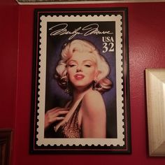 a marilyn monroe stamp hangs on the wall