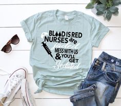 a t - shirt that says, blood is nurses and mess with you'll get se