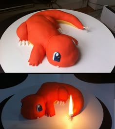 there is a cake that looks like an animal on the plate with a candle in it