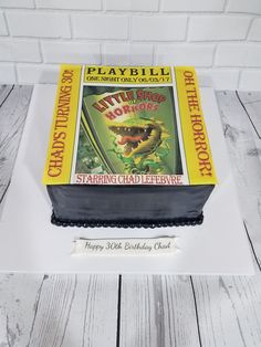 a birthday cake made to look like a book