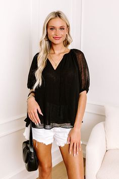 - Bask in a chic midtown moment with this airy top! - Unlined, double layered sheer chiffon material - A v-cut neckline with a tie detail - Short, loose sleeves with elastic cuffs - A flowy silhouette that ends in a curved hemline Summer V-neck Blouse With Sheer Sleeves, Sheer Sleeves V-neck Blouse For Summer, Chiffon V-neck Blouse For Day Out, Chiffon V-neck Top For Night Out, V-neck Blouse With Tie Sleeves For Party, Party V-neck Blouse With Tie Sleeves, Party Blouse With Tie Sleeves And V-neck, Casual Chiffon Top For Layering, Chic V-neck Top With Tie Sleeves